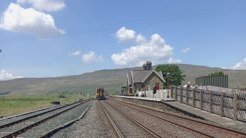 The trains may be ordinary but the landscape and stations are wonderful