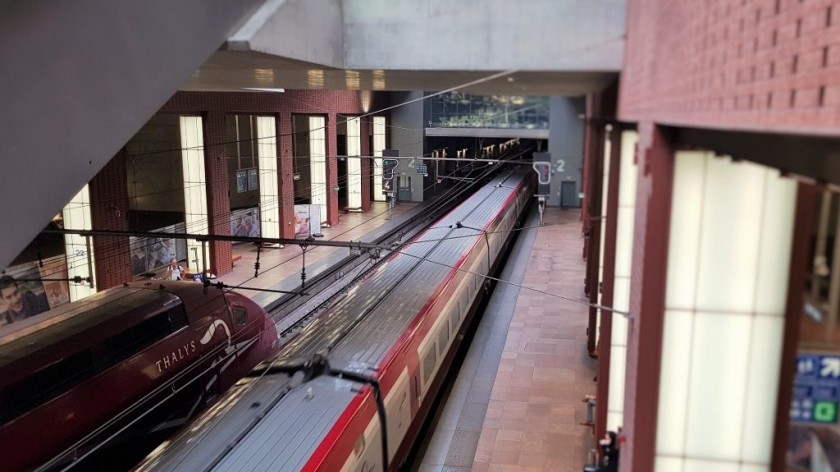 A refurbished Thalys train (on the right) arrives in Antwerpen