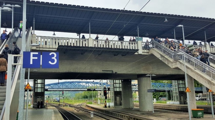 Looking up to the tram station on the bridge over the tracks at Freiburg (Breisgau) Hbf