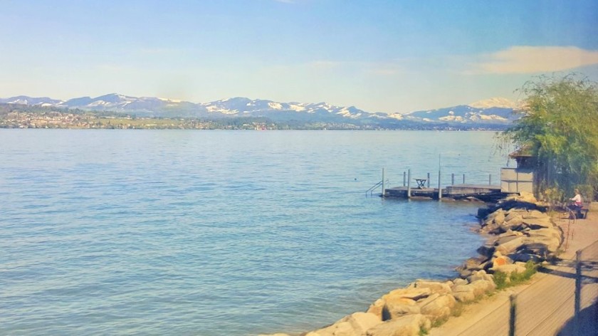 Lake Zurich comes into view as soon as the train exits a long tunnel