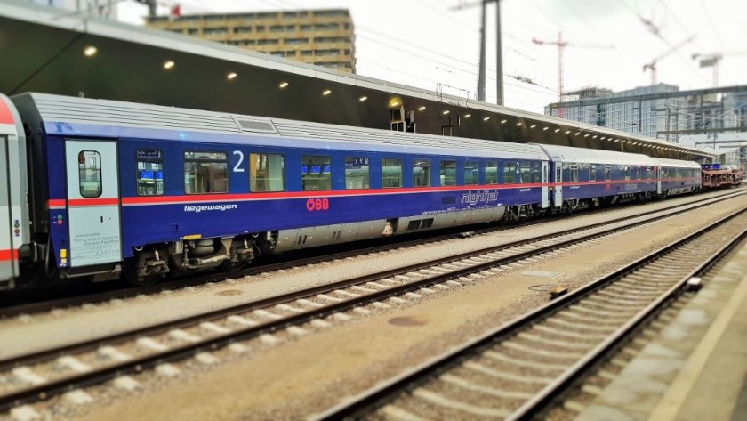 A Nightjet train with vehicles which can transport cars while their drivers sleep through the night