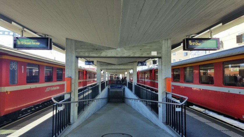 Two of the older types of RhB train making connections at Samedan