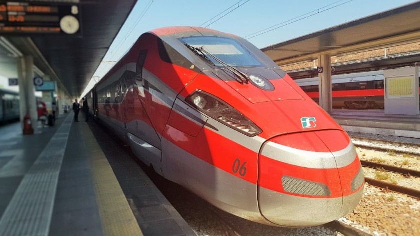 A Frecciarossa 1000 train awaits departure from Napoli Centrale