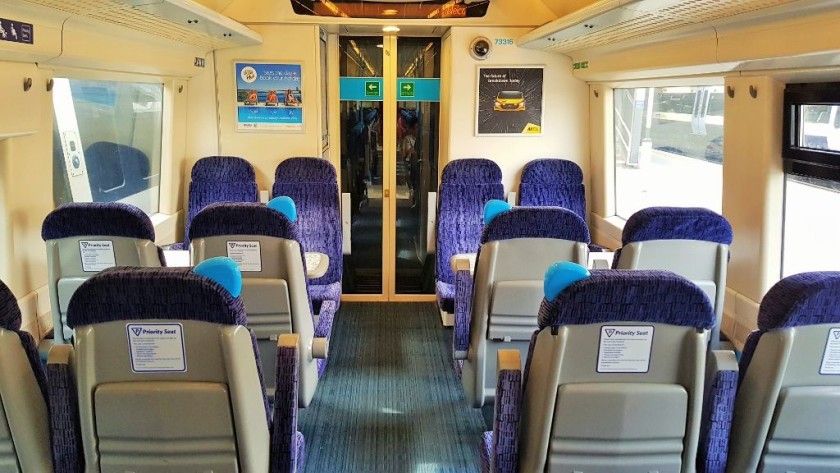 The Standard Class interior, not the priority seating is closest to the door
