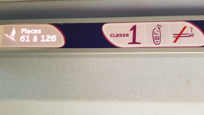 This example of a sign is showing that seat numbers 61-126 are on the upper deck