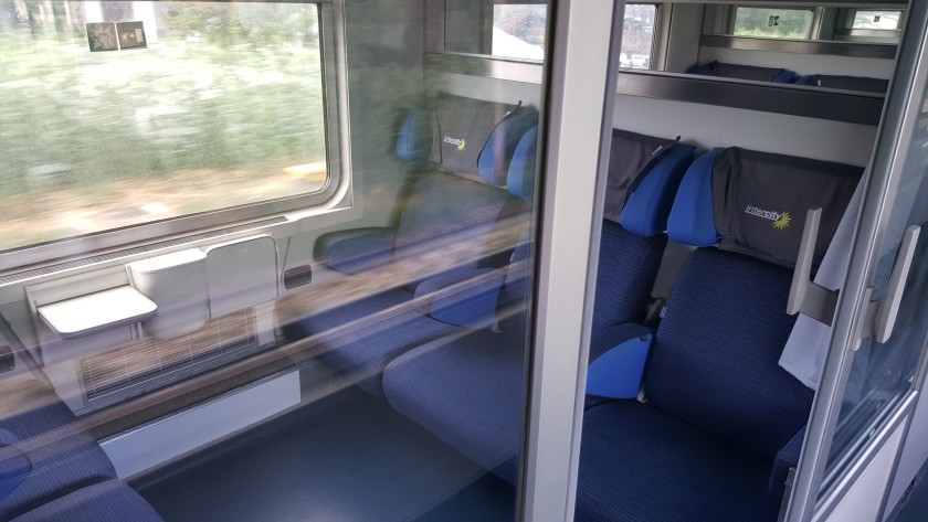 Looking into a yet to be refurbished 1st class compartment