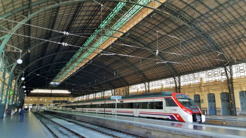 A local train waits departure from beautiful Valencia Nord station