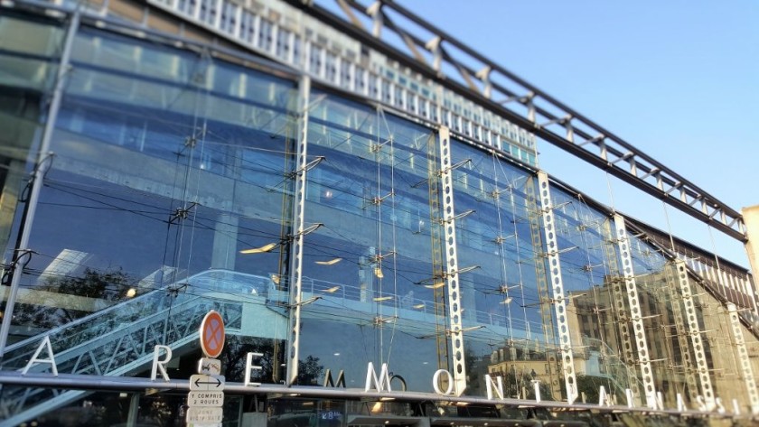 The exterior street view of Paris Montparnasse station - note the escalator heading up to the trains.