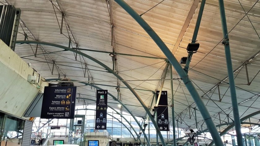 Signs hanging from the roof in Hall 3