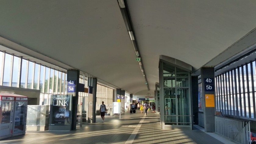 The smart bridge over the trains connects the platforms to the main station building