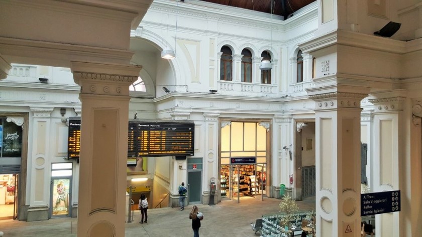 The main access to the trains from this departure hall is under the departure screens