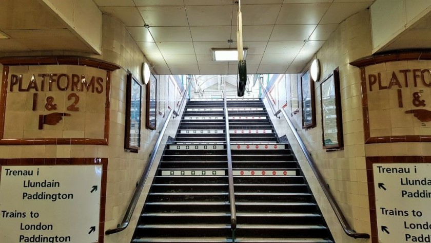 The vintage signs in the main subway still point the way to the trains