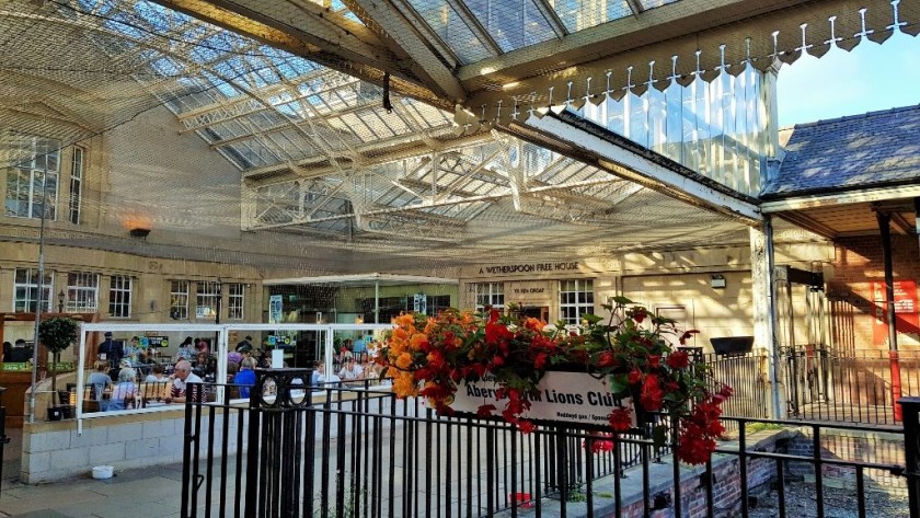 The station concourse in Aberystwyth is a popular location to have food and drinkl