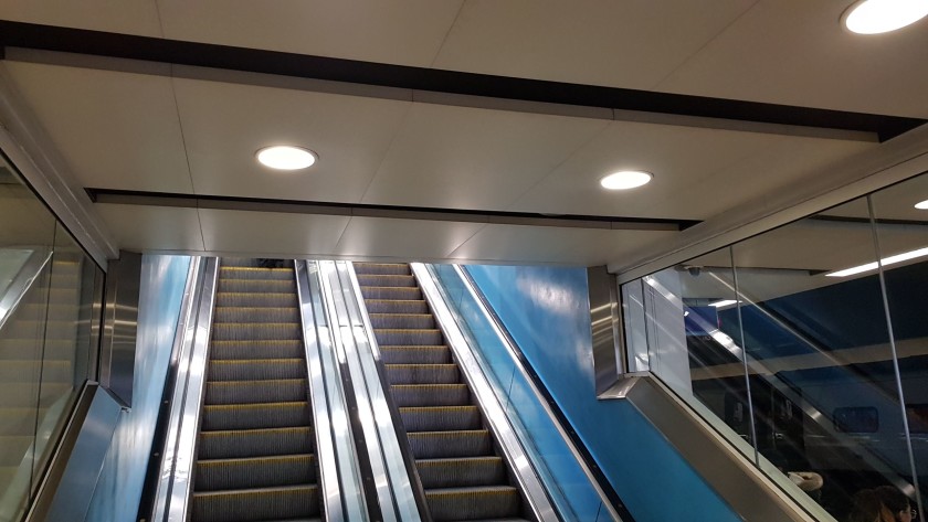 An escalator leading up to the 'Red' zone at the 'b' end of the station.