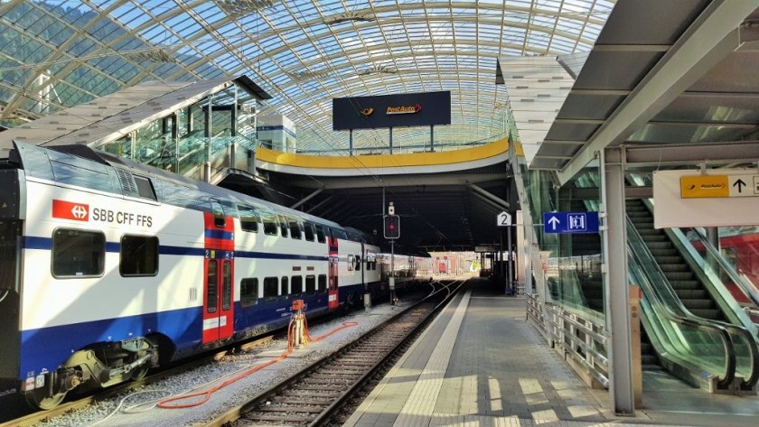 Take the escalator or elevator up to the Post Bus terminal