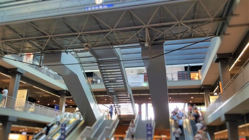 The sets of escalators in the main concourse to the exit, one level above
