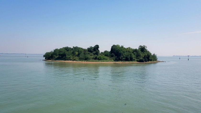 Crossing the lagoon by train between the mainland and historical Venice