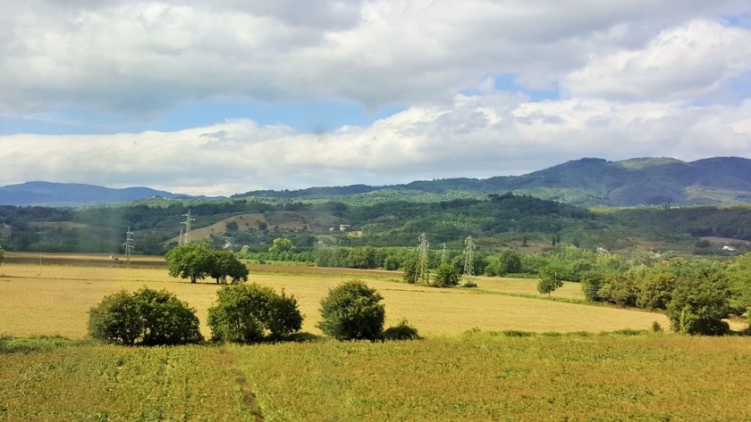 Looking over the fields of Tuscany as the train heads south from Florence