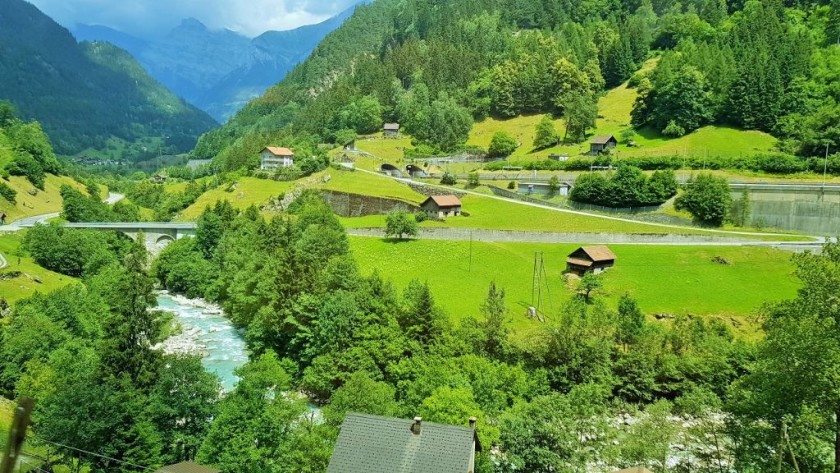 The railway line travels through a pass in the mountains