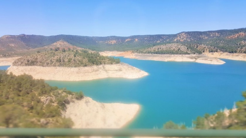 As the train nears Valencia it crosses over a series of saphire blue lakes