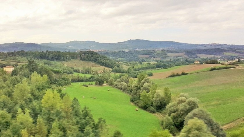 A typical view over rolling countryside from a viaduct on the Florence - Rome high speed line