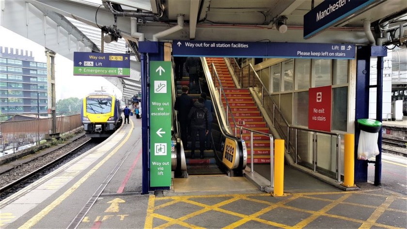 The escalator at the 'a' ends of platforms 13-14, the train is at platform 14b