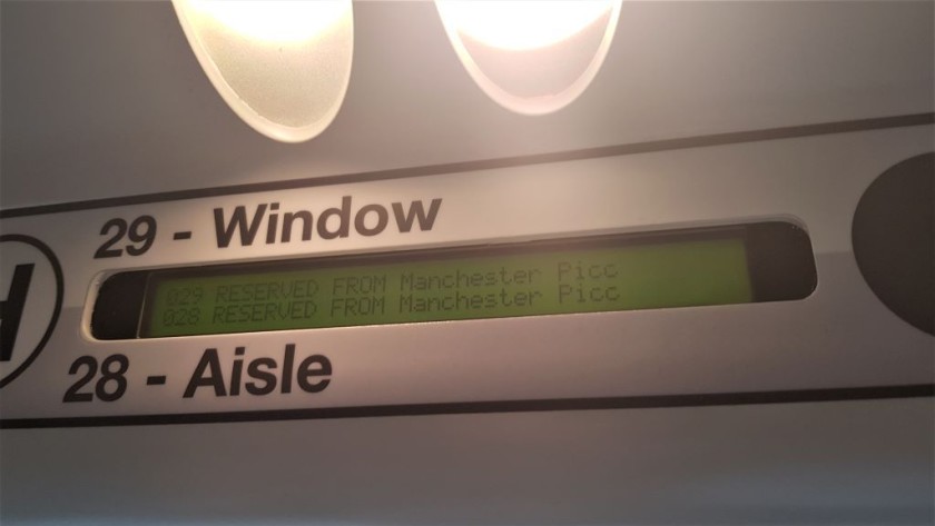 In all coaches of the train, these displays above the windows show whether a seat is reserved or available
