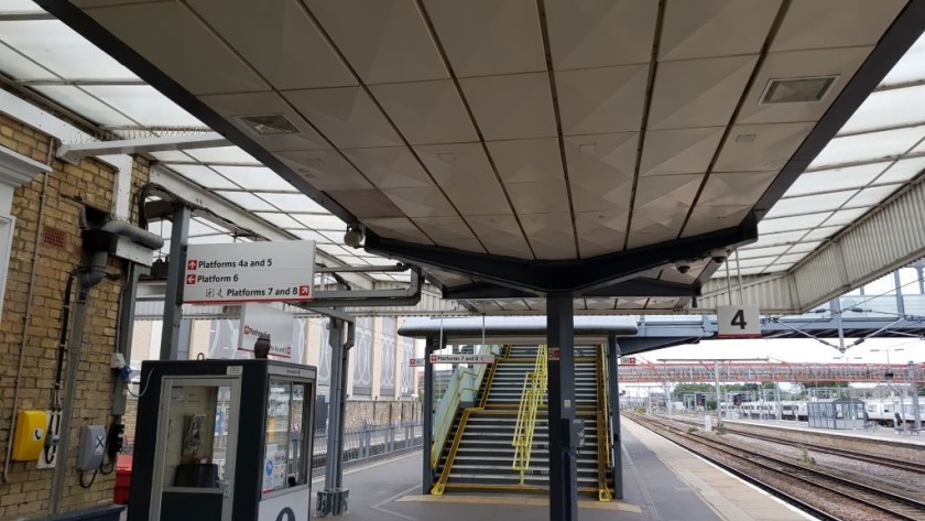 Platforms 5 and 6 are to the left of the footbridge which leads to platforms 7 and 8