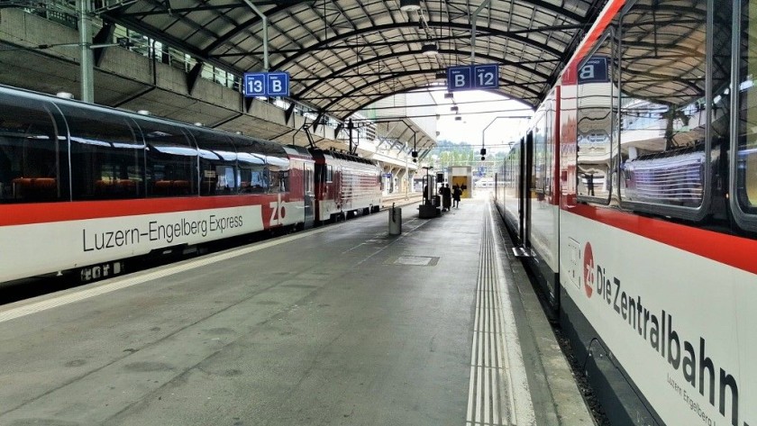 The train on the left awaits departure from Luzern