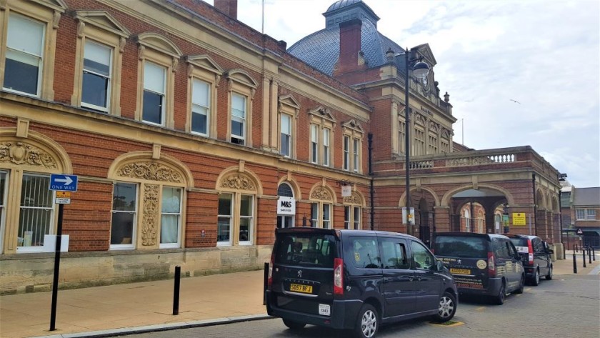 The taxi cab rank at Norwich station is right by the main exit