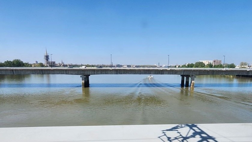 Crossing the River Garonne before arriving at Bordeaux St Jean station
