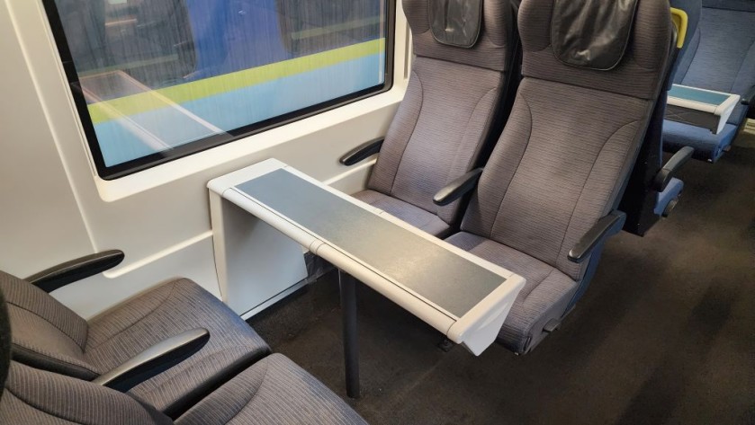 Standard Class seats at a table on a Eurostar e320 train