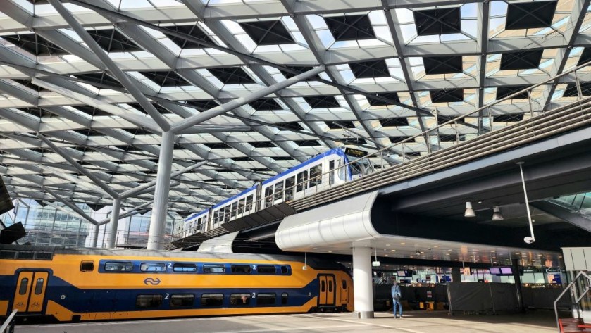 Tram and train at Den Haag Centraal station