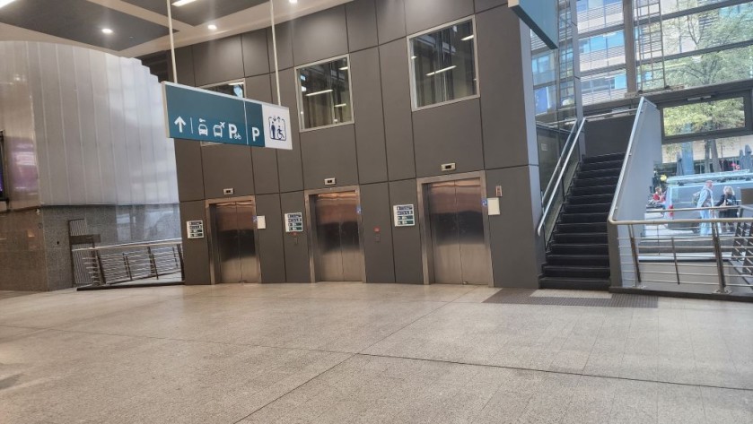 Taking the stairs and lifts down from Eurostar arrivals at Bruxelles Midi