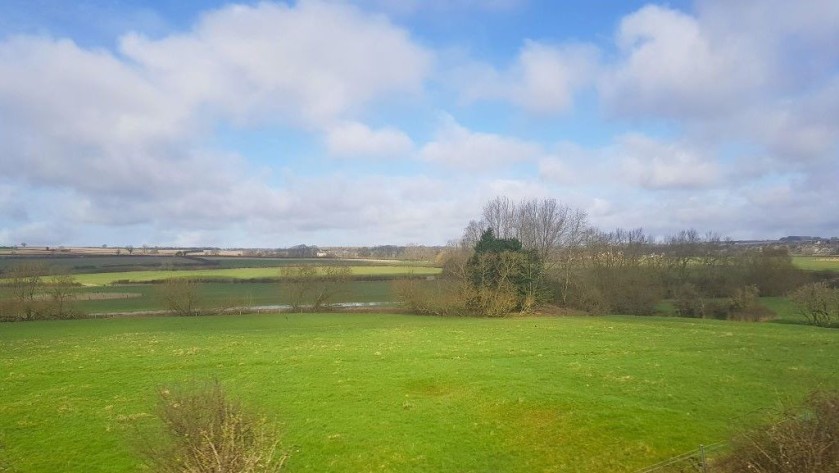 Passing through The Cotswolds on a train
