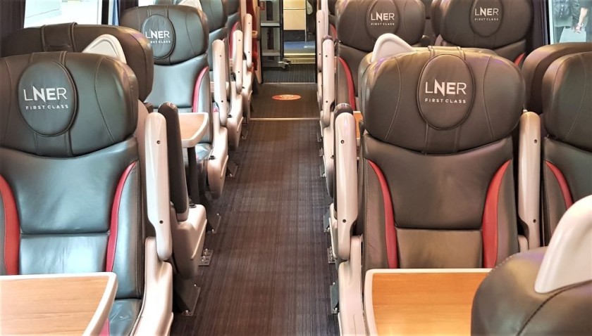 The leather clad First Class seating is arranged 2 + 1 across the aisle