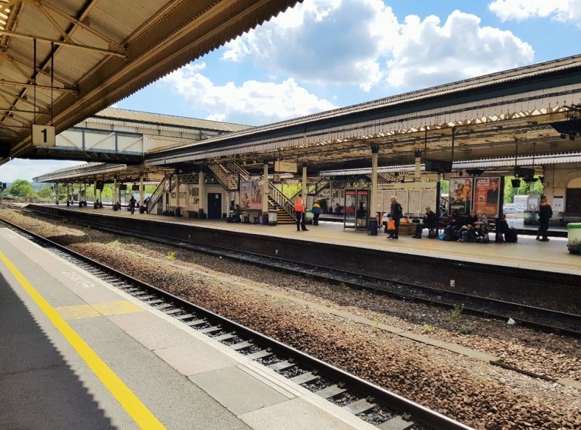 Looking left on platform 1 towards the main footbridge at the station