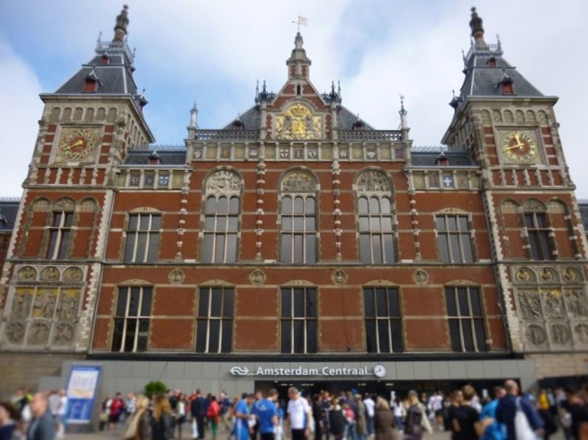 The front of Amsterdam Centraal  between the two tram stations