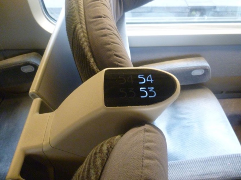 The seat numbers are between the seats