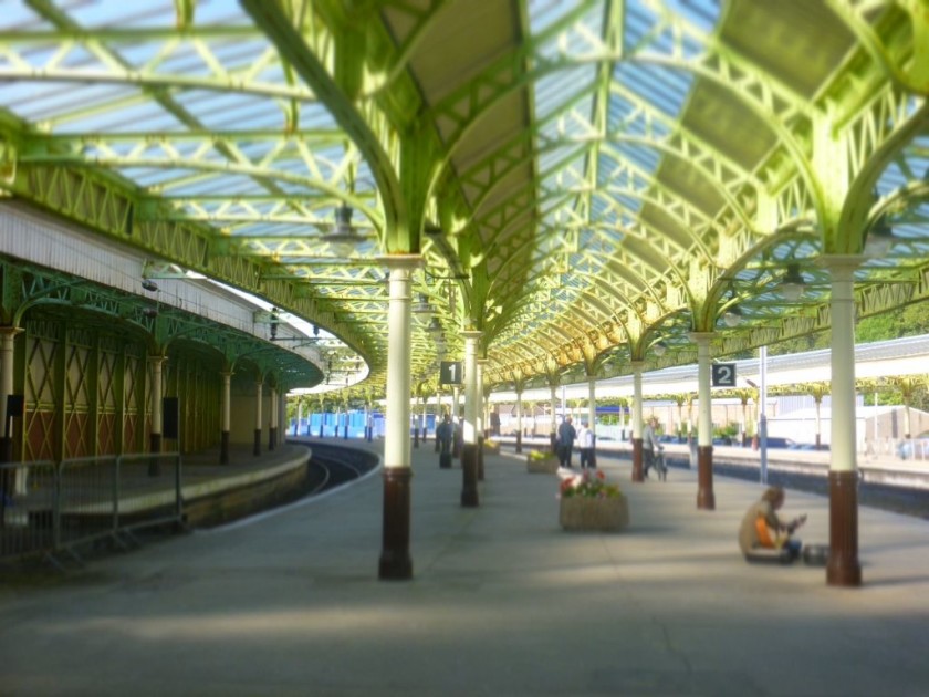 The trains depart from under a wonderfully restored canopy
