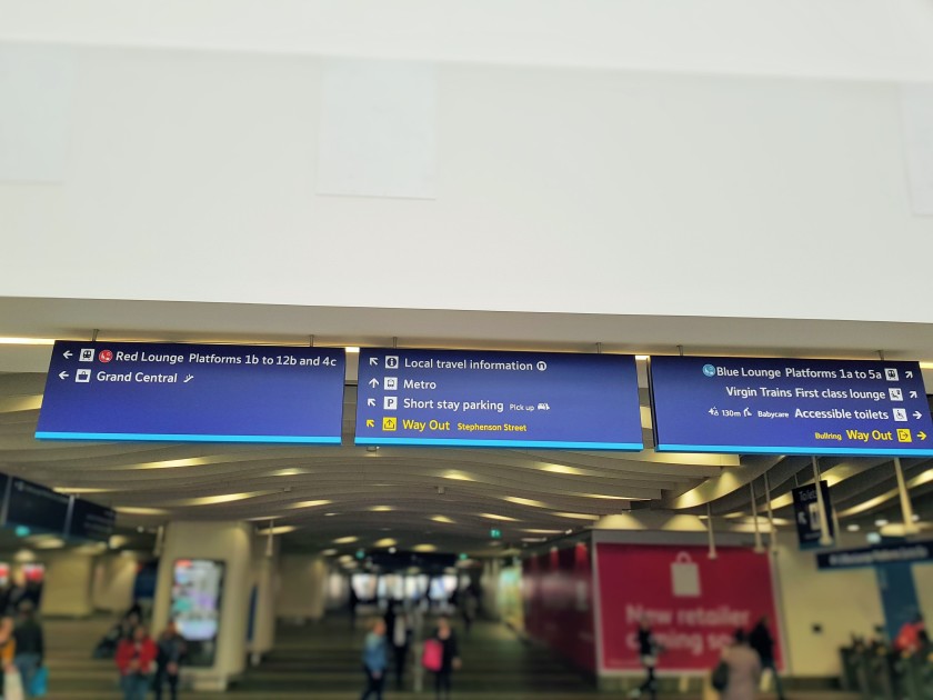 New Street is a station where using the signage can help, they vary at each entrance point