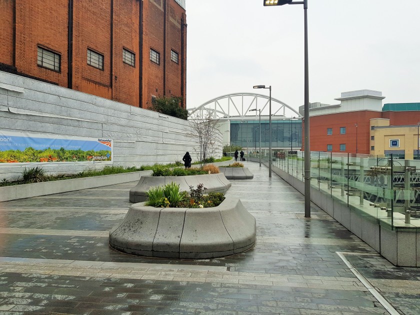 Then turn right, the step up into the city centre are at the end of this path