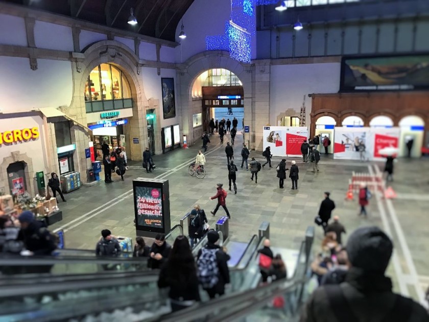 Descending from the bridge, the arch to the left leads to the SNCF station, the arch ahead leads to the tram stops