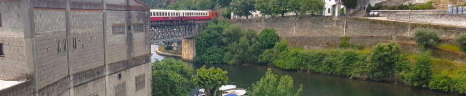 A train departs from Pinhao on the Douro Valley line