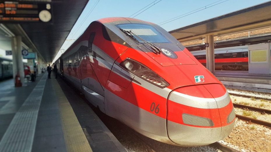 A Frecciarossa 1000 train awaits departure from Napoli Centrale