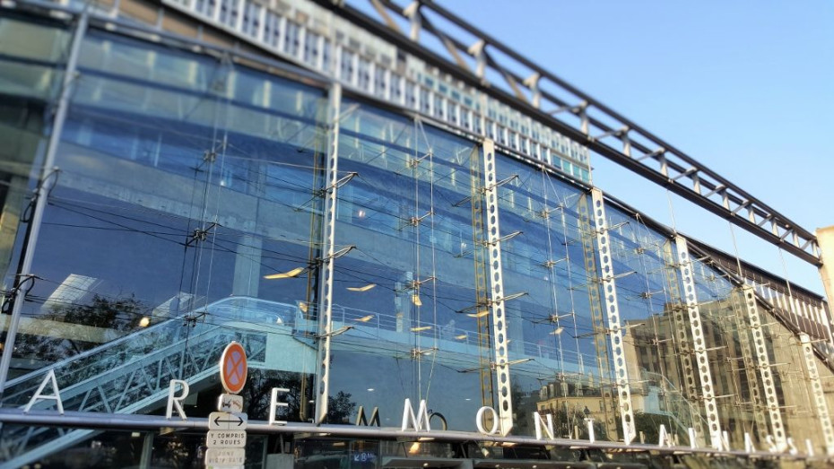 The exterior street view of Paris Montparnasse station - note the escalator heading up to the trains.