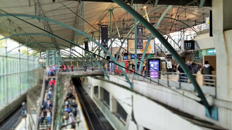 Passengers head down the escalators to take a TGV train - Eurostar passengers take a different route