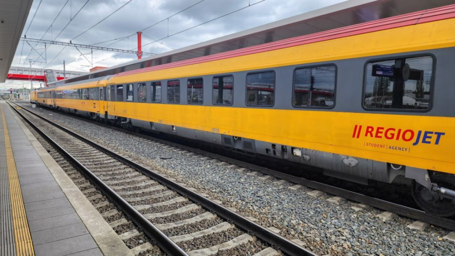 A Regiojet train departs for Prague