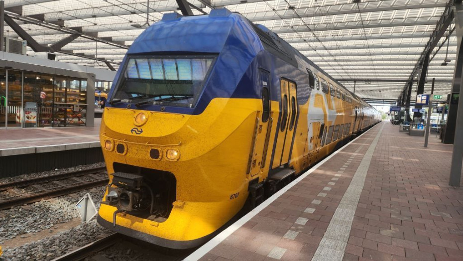 An IC train operated by NS has arrived in Rotterdam