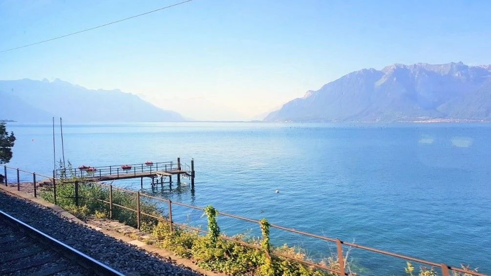 The view over Lake Geneva from a train south of Monetreux.